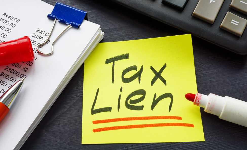 post it note with tax lien