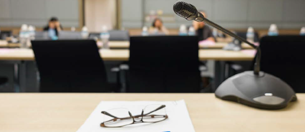 desk with notes and microphone